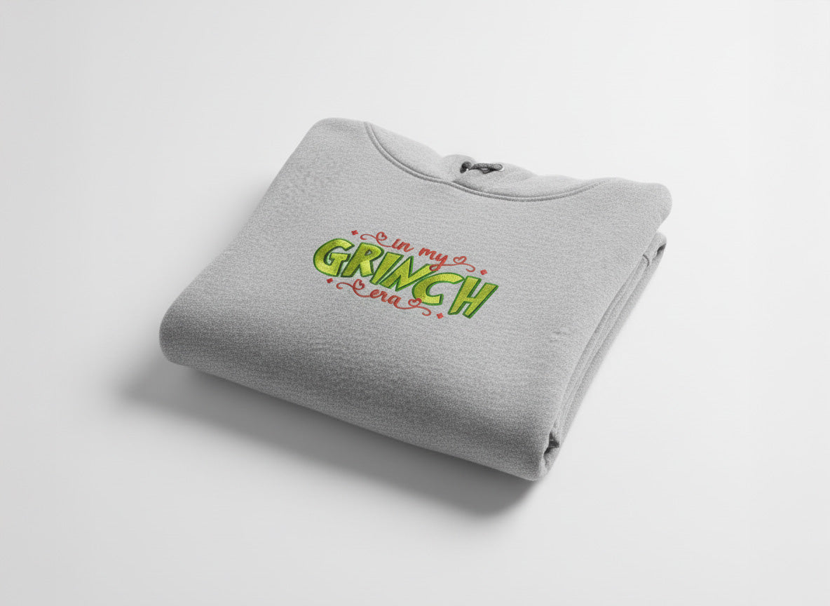 In My Grinch Era – Embroidered Christmas Hoodie (Unisex)